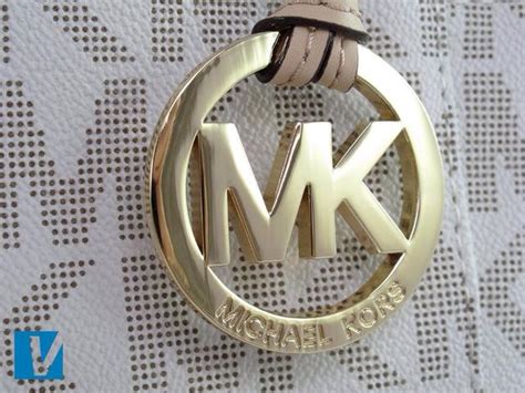 authentic vs fake michael kors hamilton|michael kors real logo.